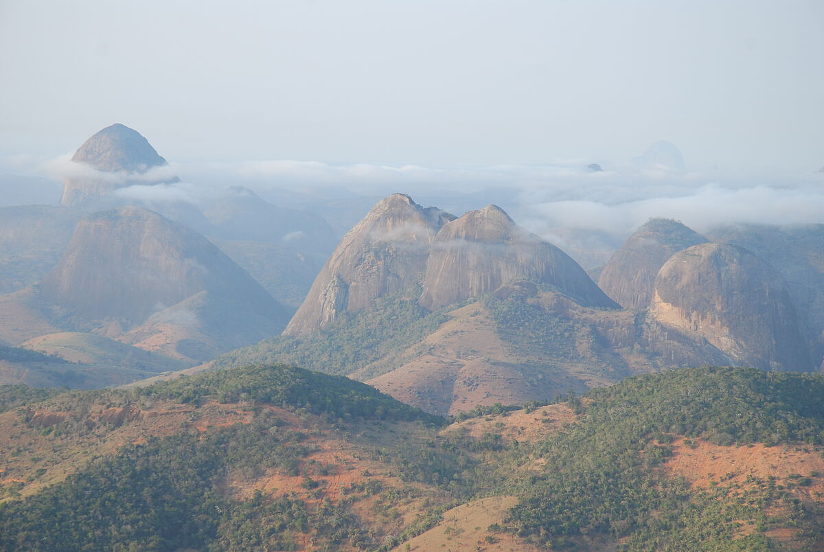 clouds surrounding inselbergs, Pedra da Boca, Brazil